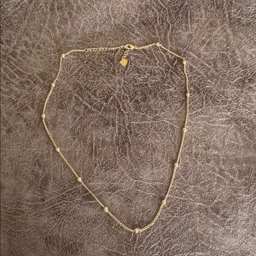 Gold beaded chocker necklace